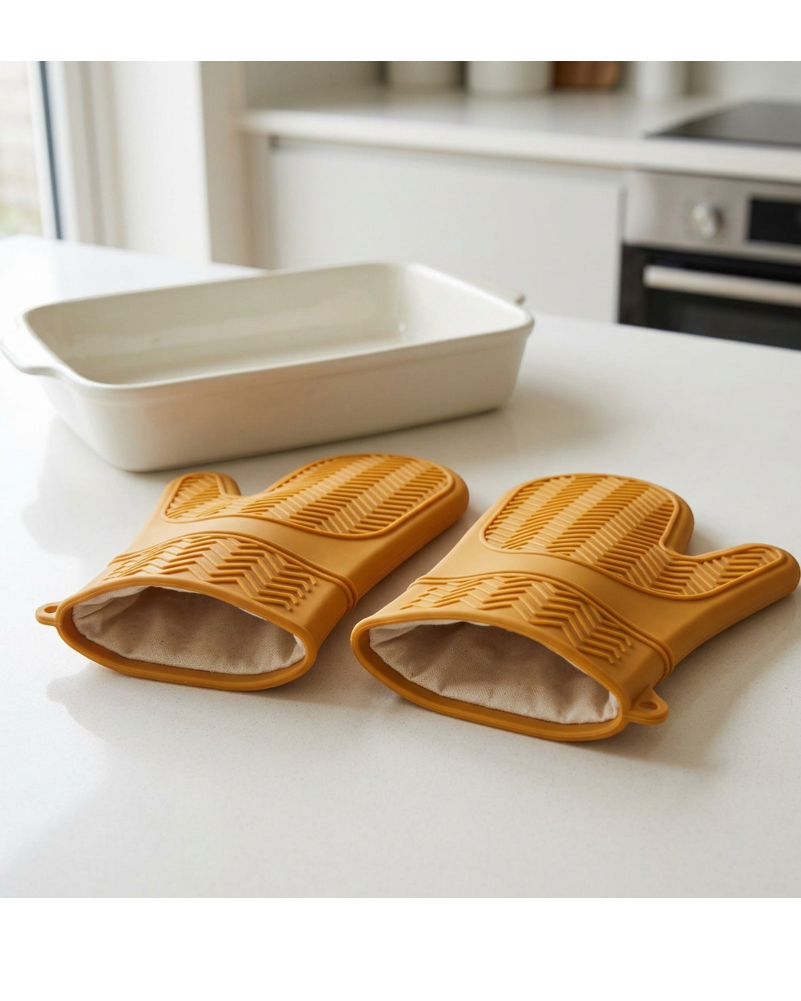 Baskliving Flexclad Silicone Oven Mitts 11 in Ochre Lined Pair - Lifestyle view